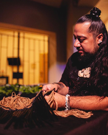 an artist weaving